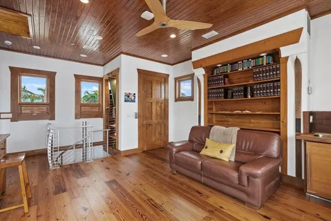 a lobby with furniture and garden view
