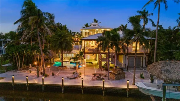 a kitchen with stainless steel appliances granite countertop a stove and a refrigerator