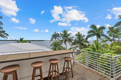 a bed room with a bed and a chair