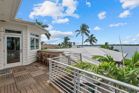 a bedroom with a bed and a table in it