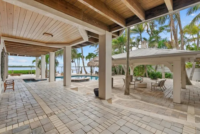 an aerial view of multiple houses with yard