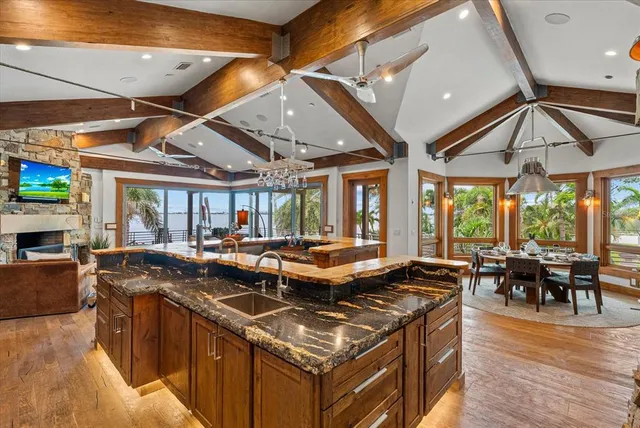 a bedroom with a bed and a wall painting