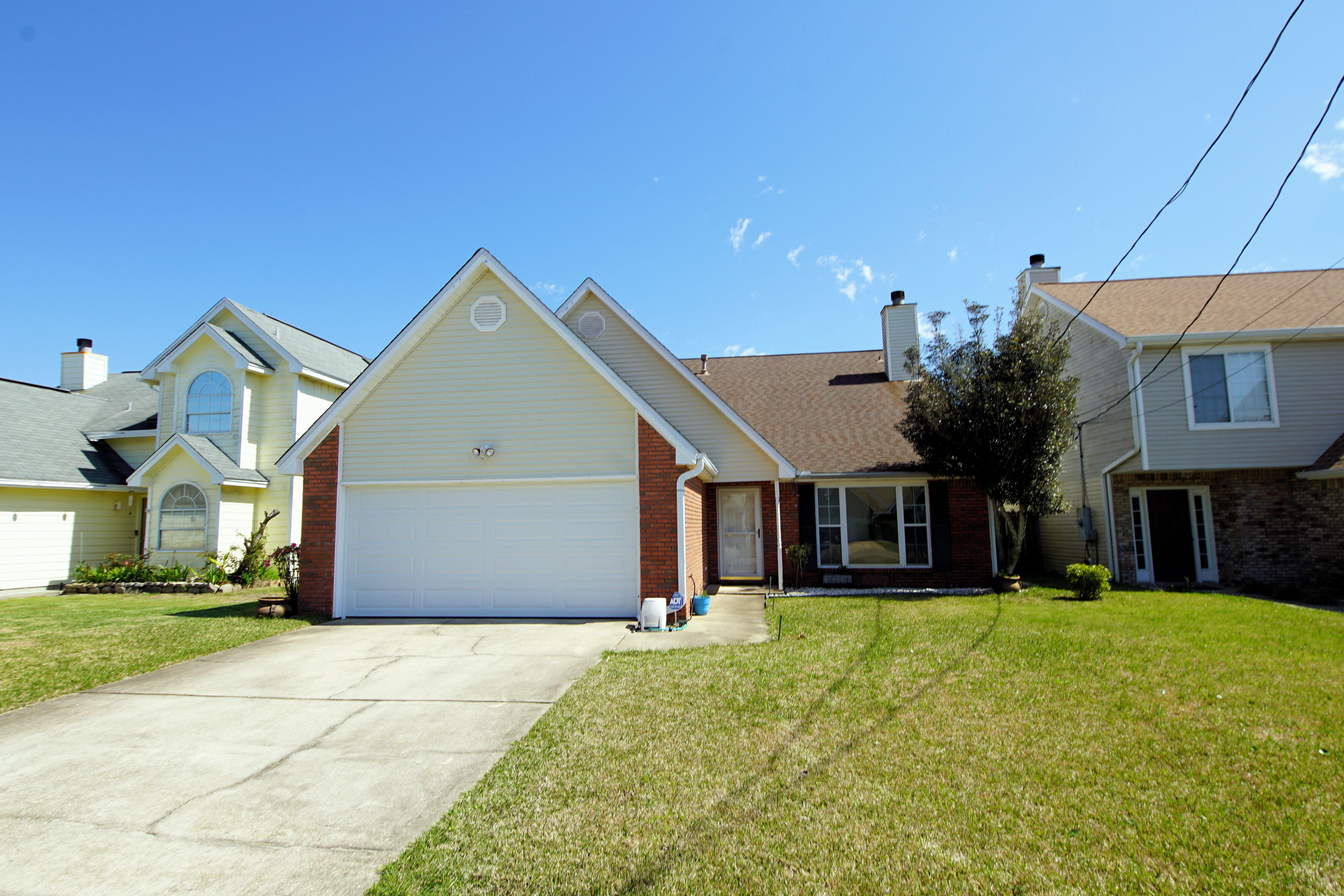 467 Sandy Ridge Circle Mary Esther, FL 32569 - Photo 2 of 37 a front view of house with yard