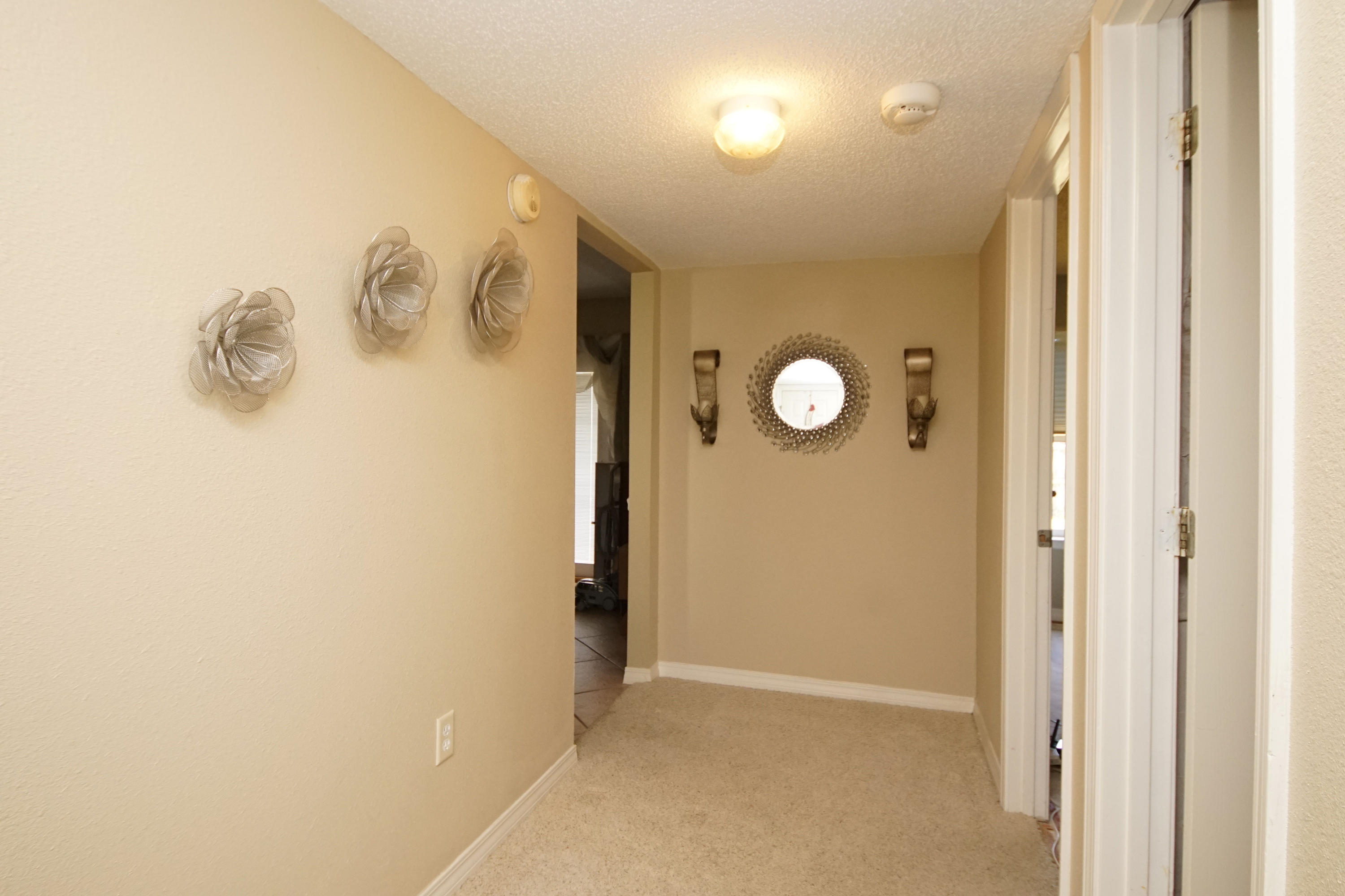 467 Sandy Ridge Circle Mary Esther, FL 32569 - Photo 21 of 37 a view of a livingroom and a hallway