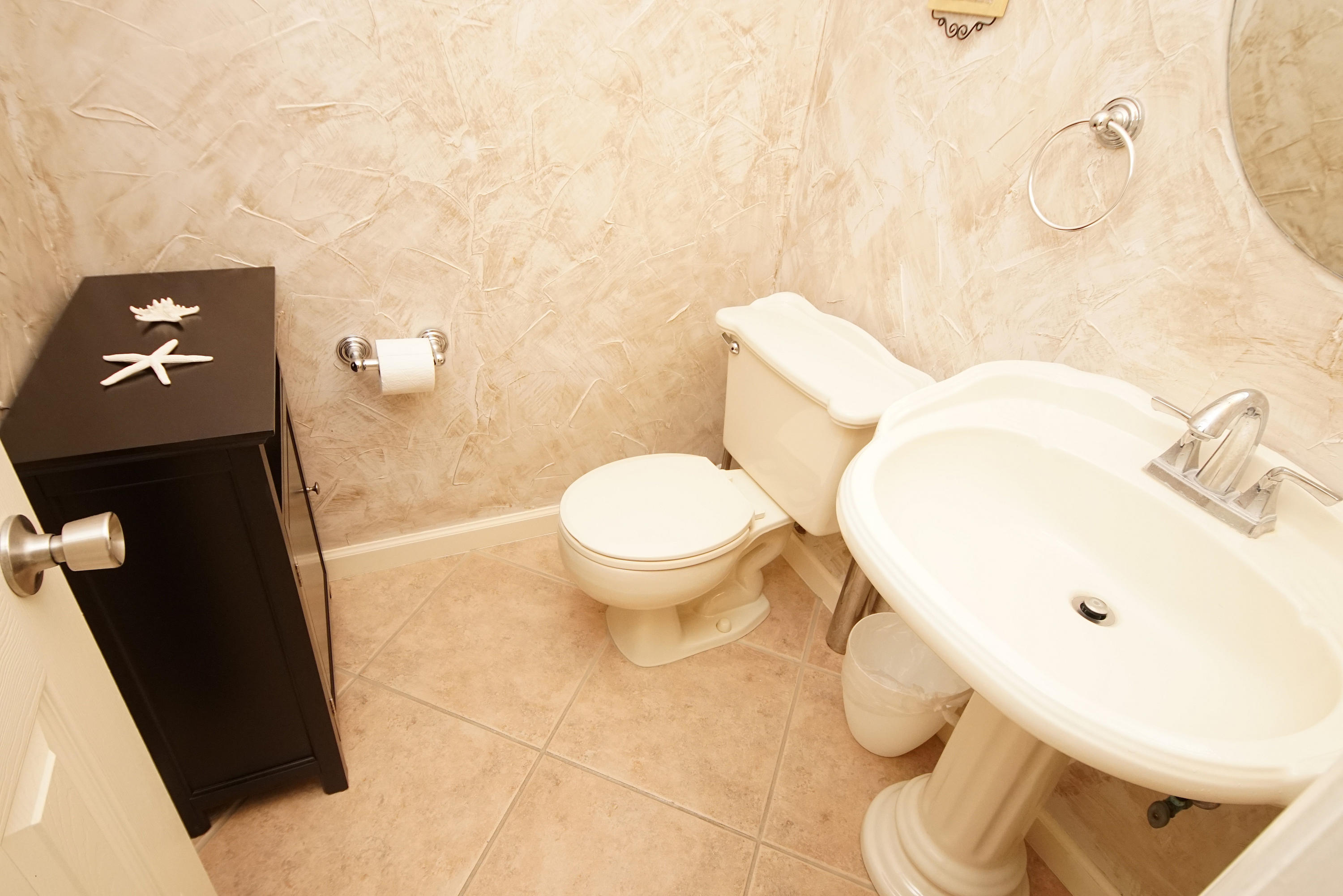 467 Sandy Ridge Circle Mary Esther, FL 32569 - Photo 23 of 37 a bathroom with a sink and a toilet