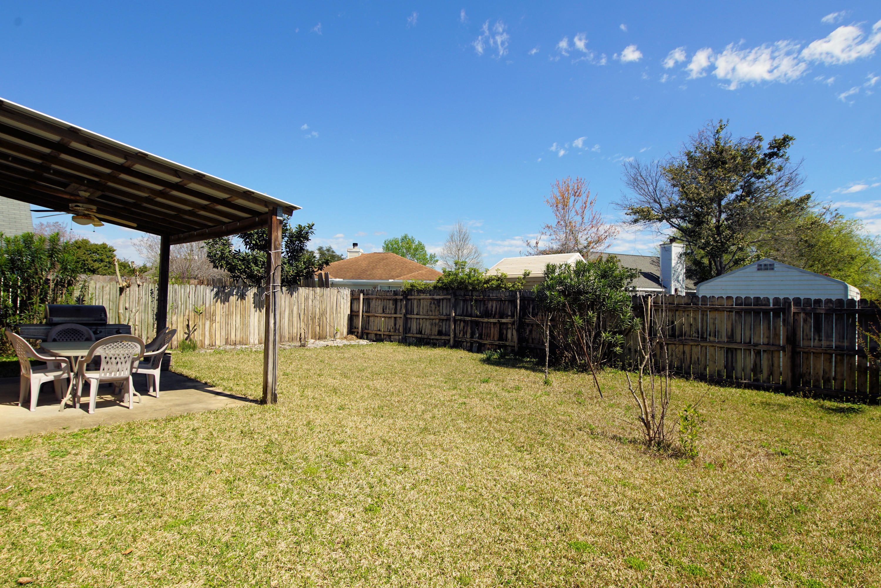 467 Sandy Ridge Circle Mary Esther, FL 32569 - Photo 36 of 37 a view of a backyard