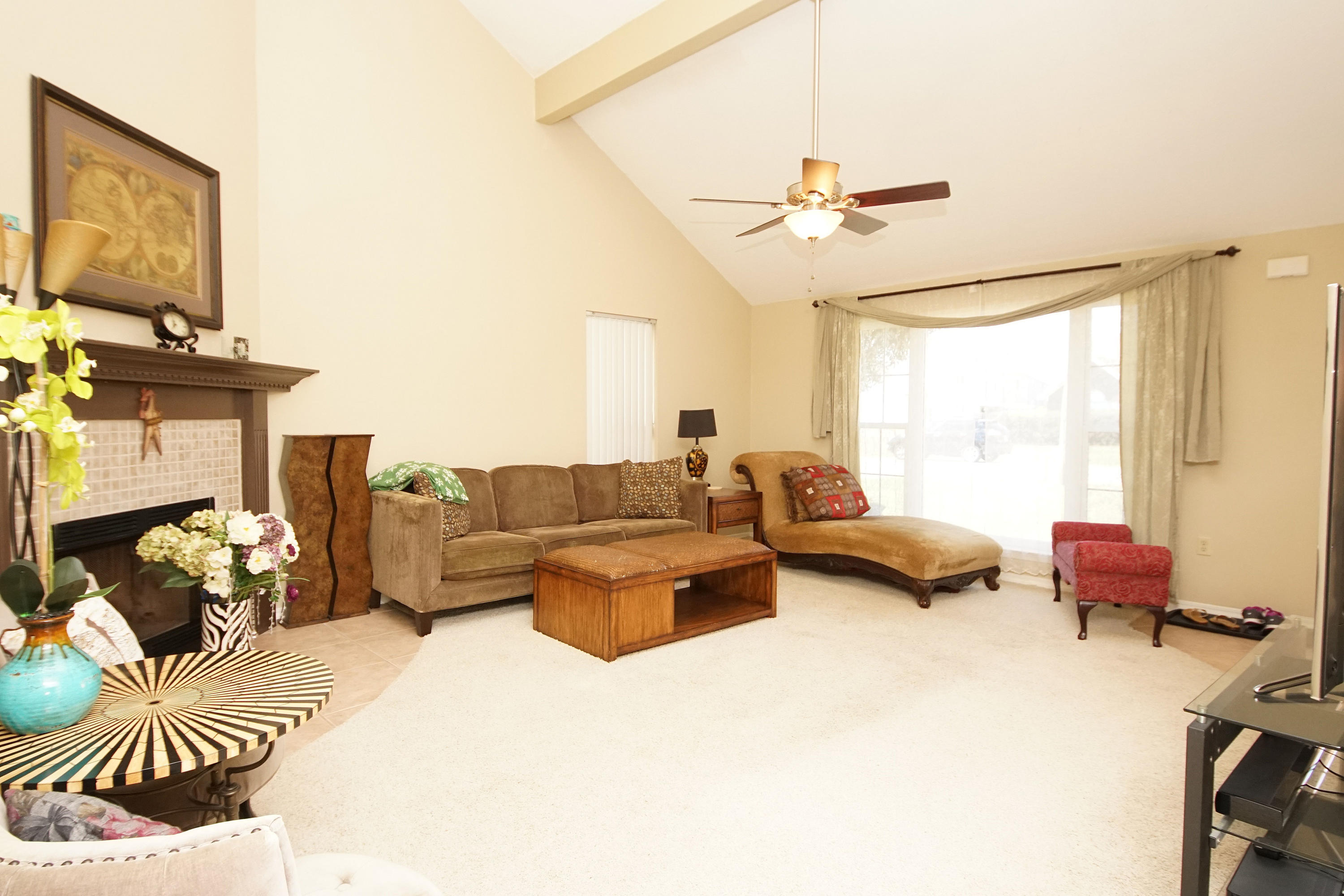 467 Sandy Ridge Circle Mary Esther, FL 32569 - Photo 6 of 37 a living room with furniture and a chandelier