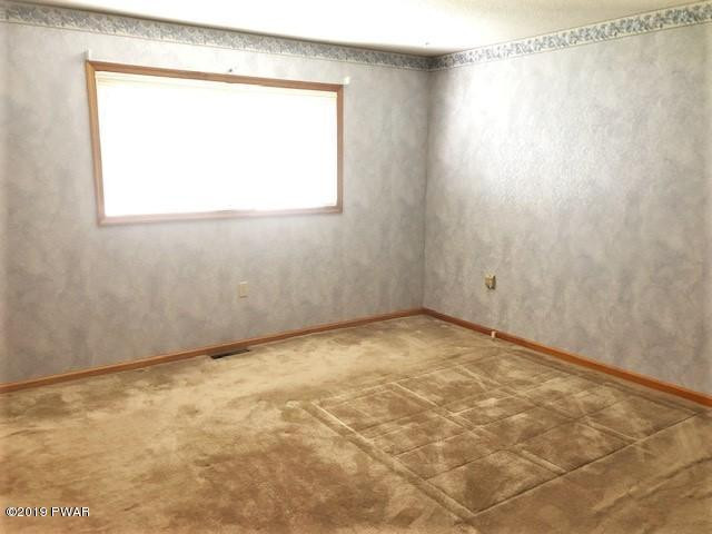 161 Tuthill Road Waymart, PA 18472 - Photo 15 of 31 a view of a room that has a window in it