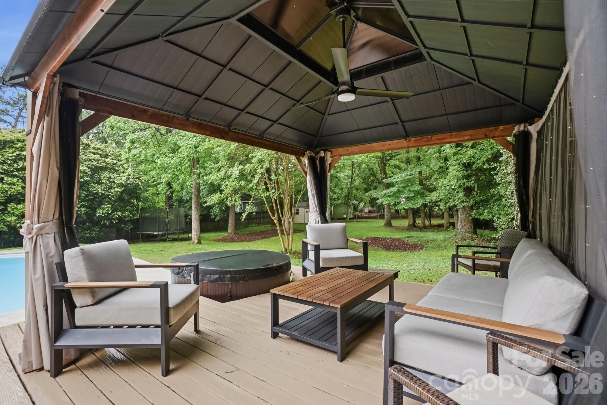 824 Riverwood Road Charlotte, NC 28270 - Photo 27 of 37 a garden view with a seating space