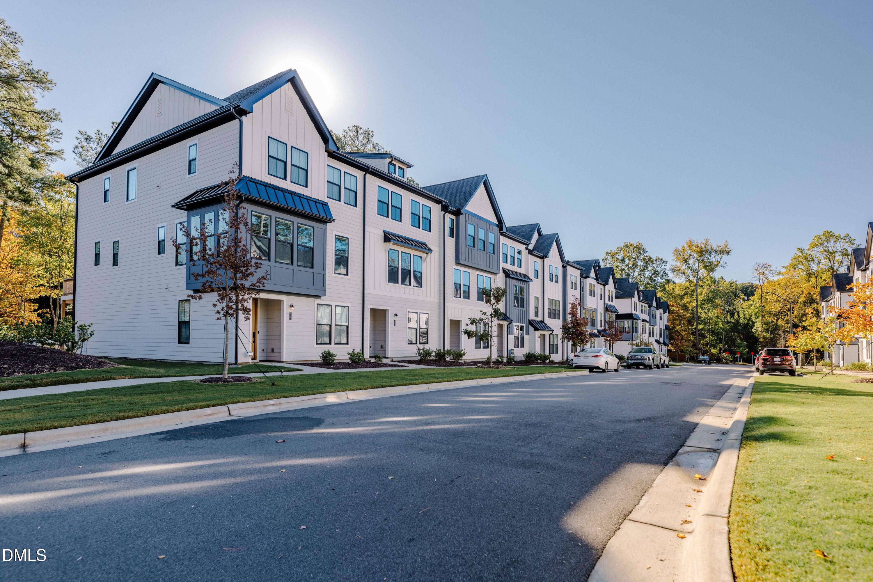 6420 Tanner Oak Lane Raleigh, NC 27613 - Photo 30 of 49 a very nice looking house with a yard and plants