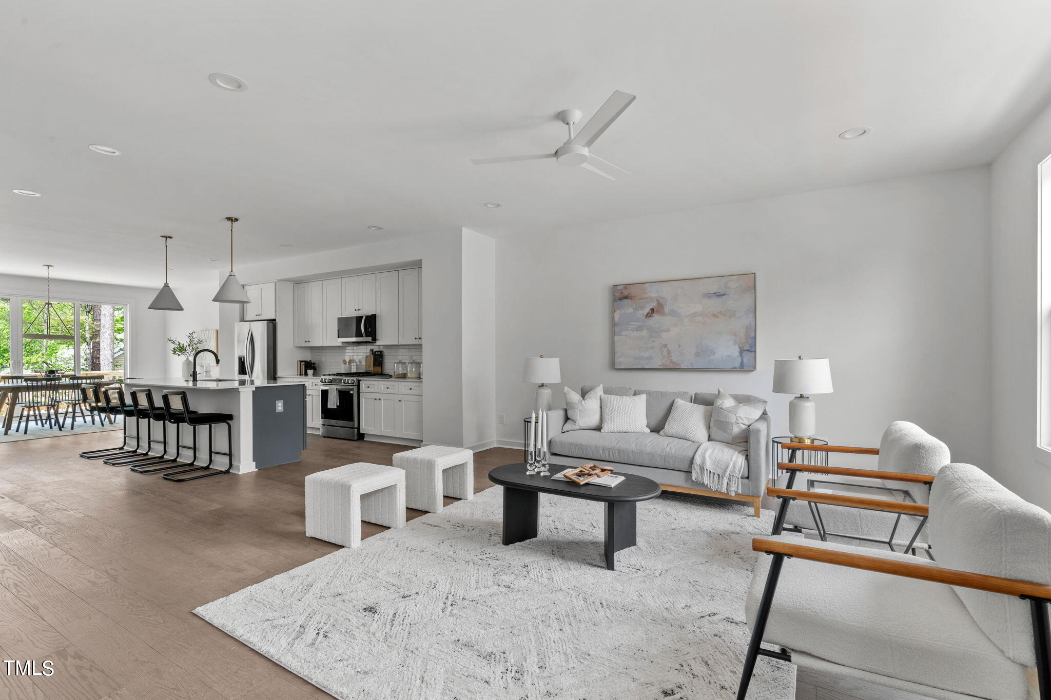 6420 Tanner Oak Lane Raleigh, NC 27613 - Photo 7 of 49 a living room with furniture and kitchen view