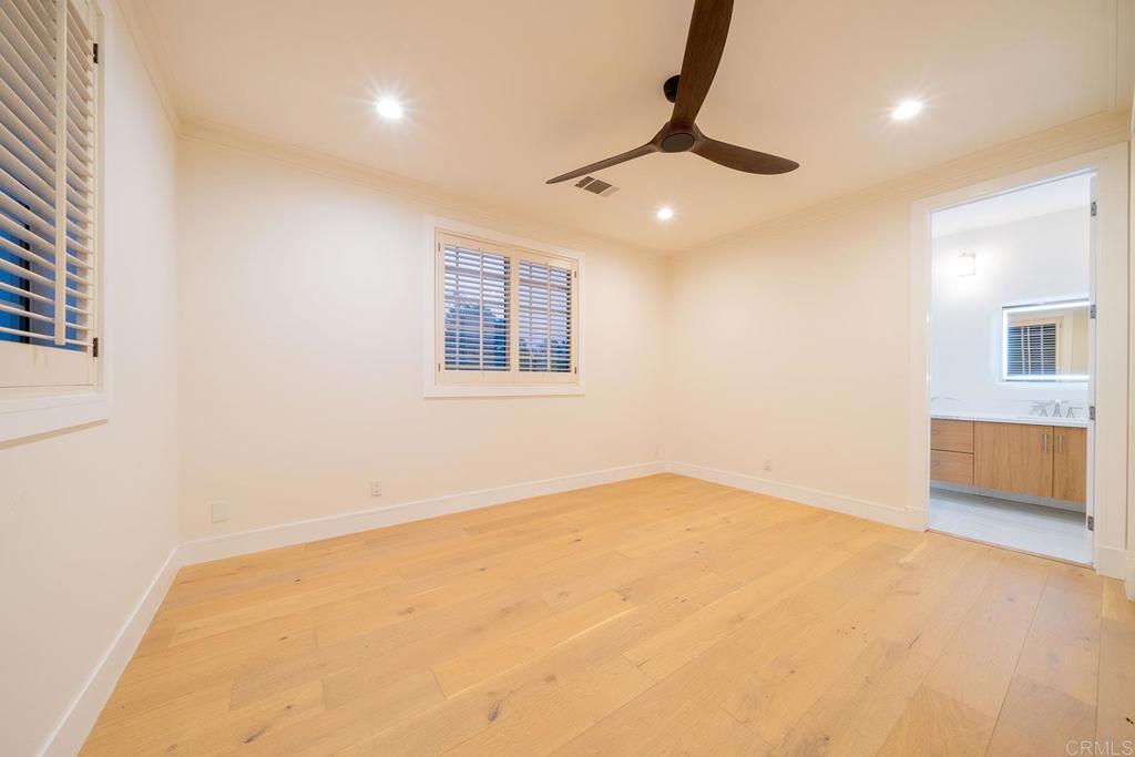 41965 Mesa Verdugo Temecula, CA 92592 - Photo 39 of 68 en empty room with windows and ceiling fan