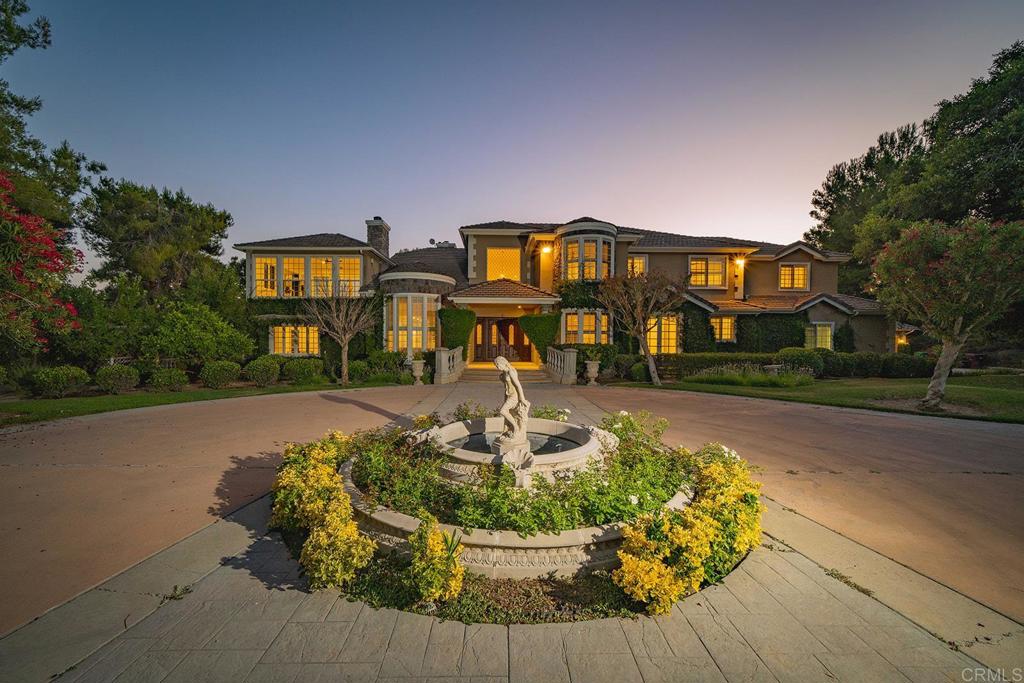 41965 Mesa Verdugo Temecula, CA 92592 - Photo 4 of 68 a front view of a house with a yard