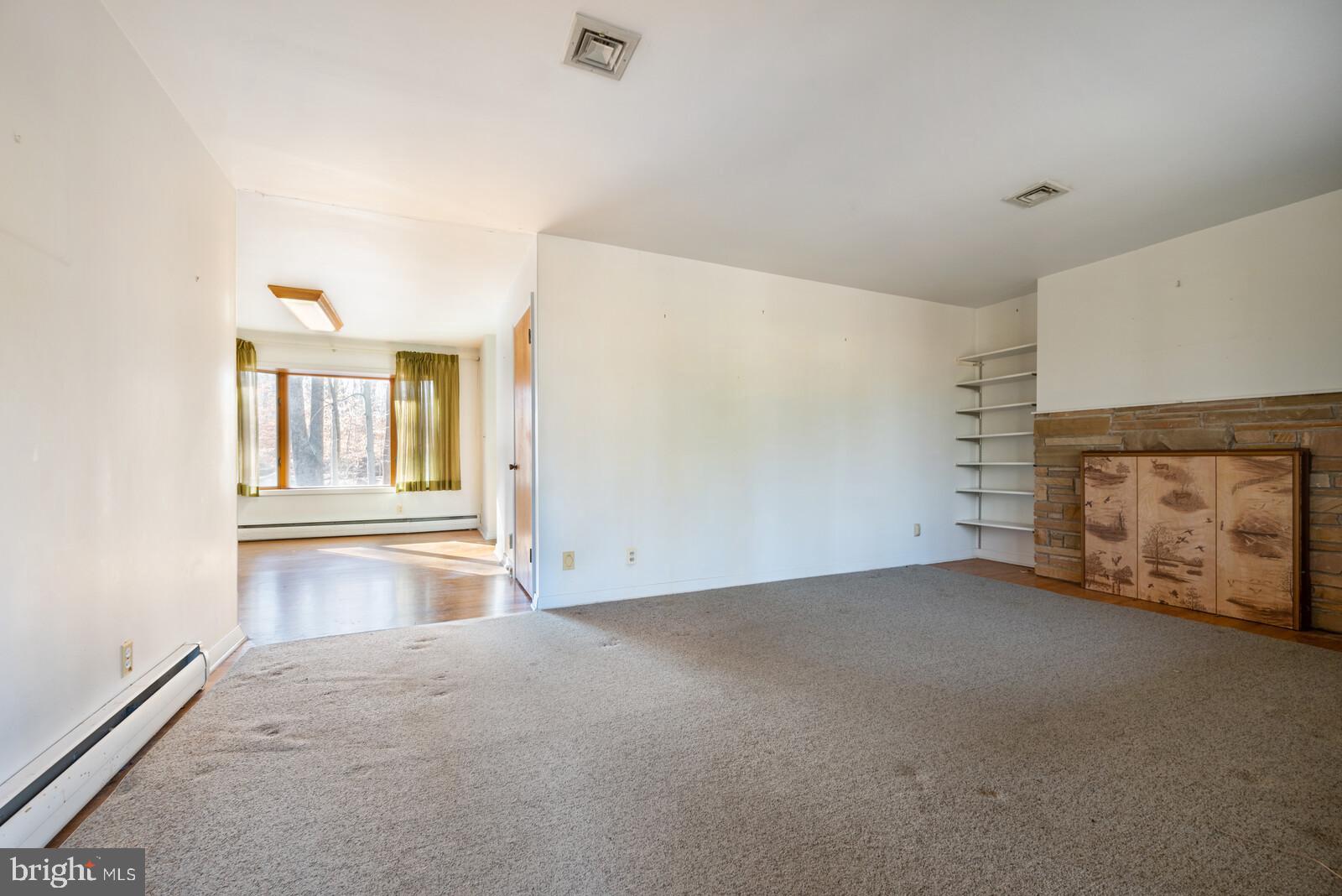 104 Woosamonsa Road Pennington, NJ 08534 - Photo 5 of 32 View from front door - living room