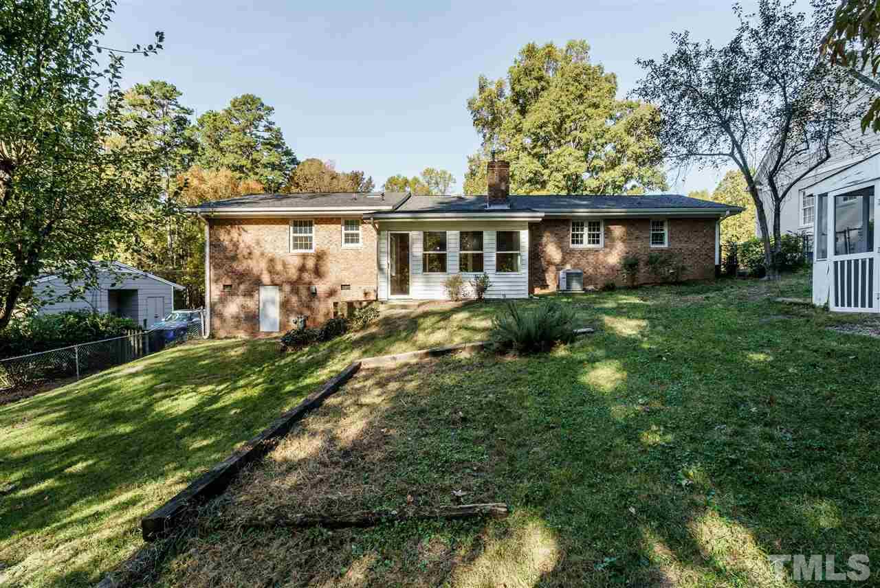 4224 Rowan Street Raleigh, NC 27609 - Photo 24 of 24 a front view of a house with a garden