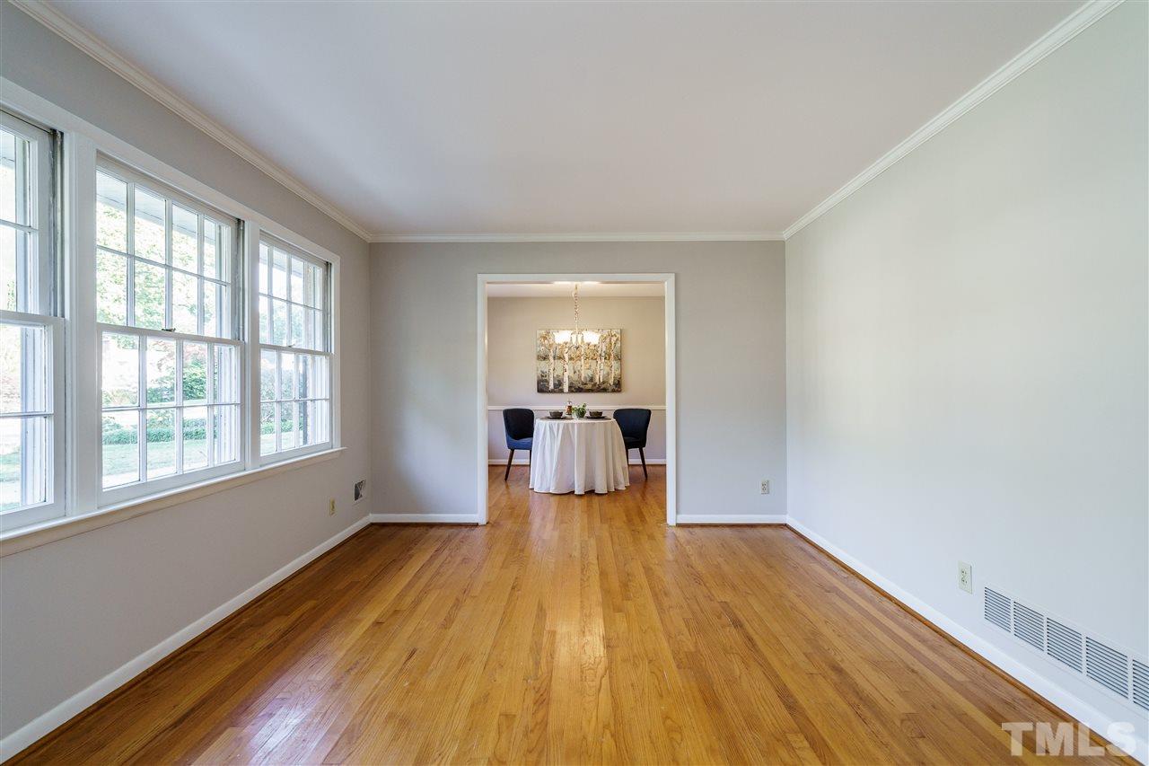4224 Rowan Street Raleigh, NC 27609 - Photo 4 of 24 a view of empty room with wooden floor