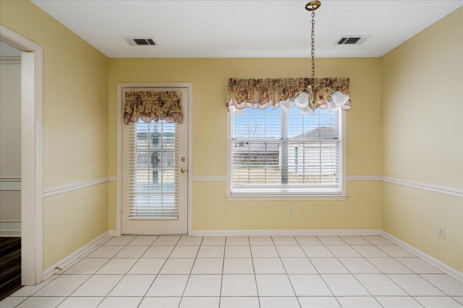 489 Autumn Trail Cove Collierville, TN 38017 - Photo 14 of 30 a view of an empty room with a window