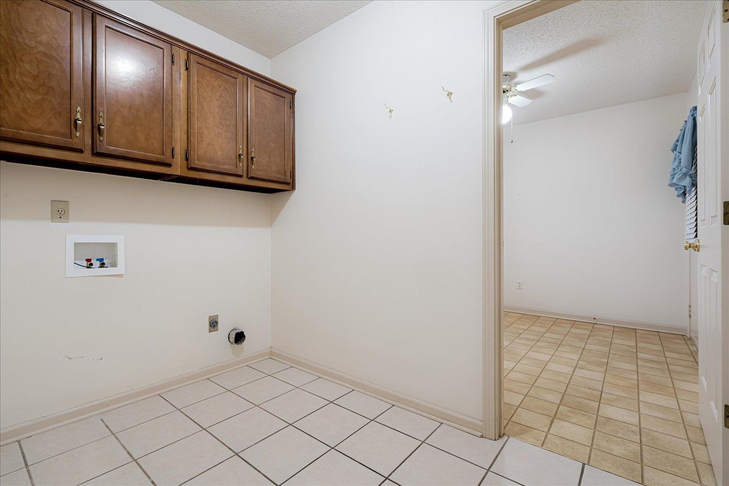 489 Autumn Trail Cove Collierville, TN 38017 - Photo 17 of 30 a view of cabinets and wooden floor