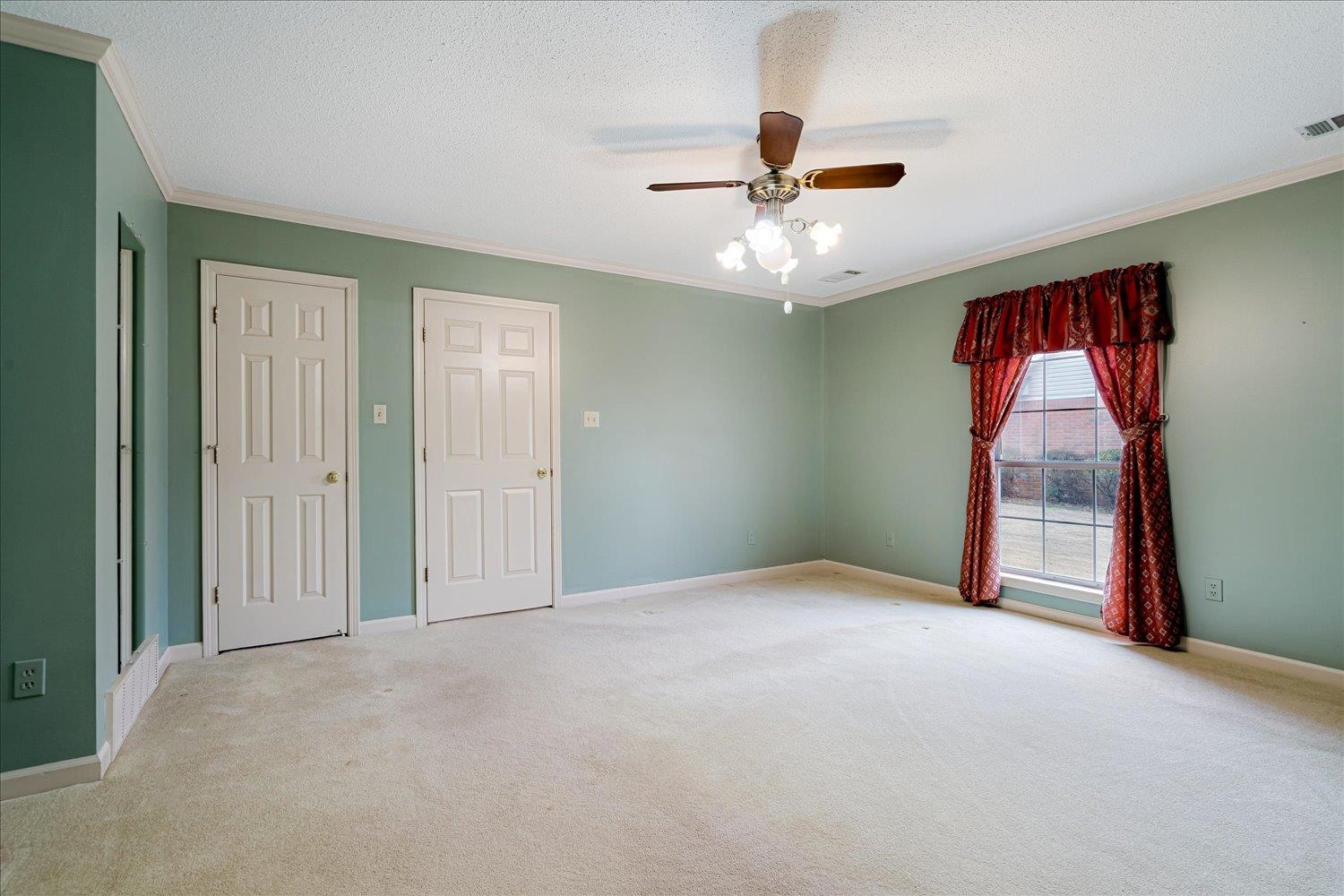 489 Autumn Trail Cove Collierville, TN 38017 - Photo 20 of 30 a view of empty room with ceiling fan