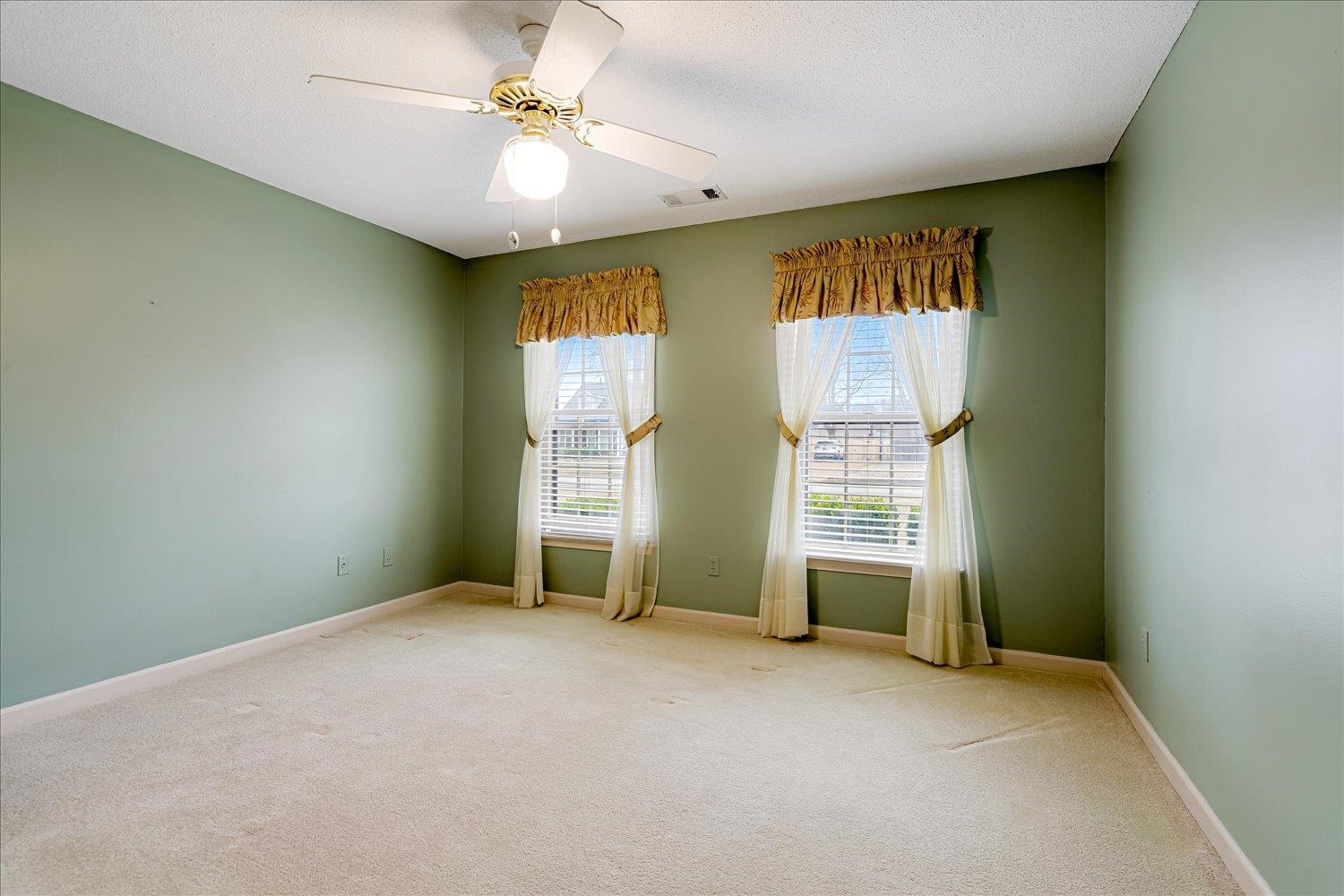489 Autumn Trail Cove Collierville, TN 38017 - Photo 24 of 30 a view of an empty room with a window
