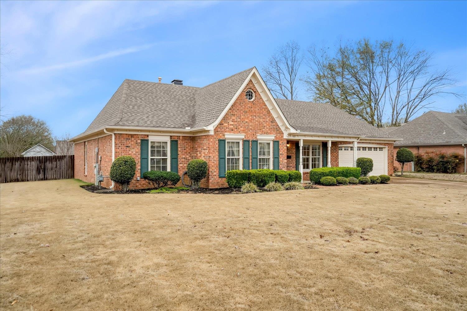 489 Autumn Trail Cove Collierville, TN 38017 - Photo 3 of 30 a front view of a house with a yard