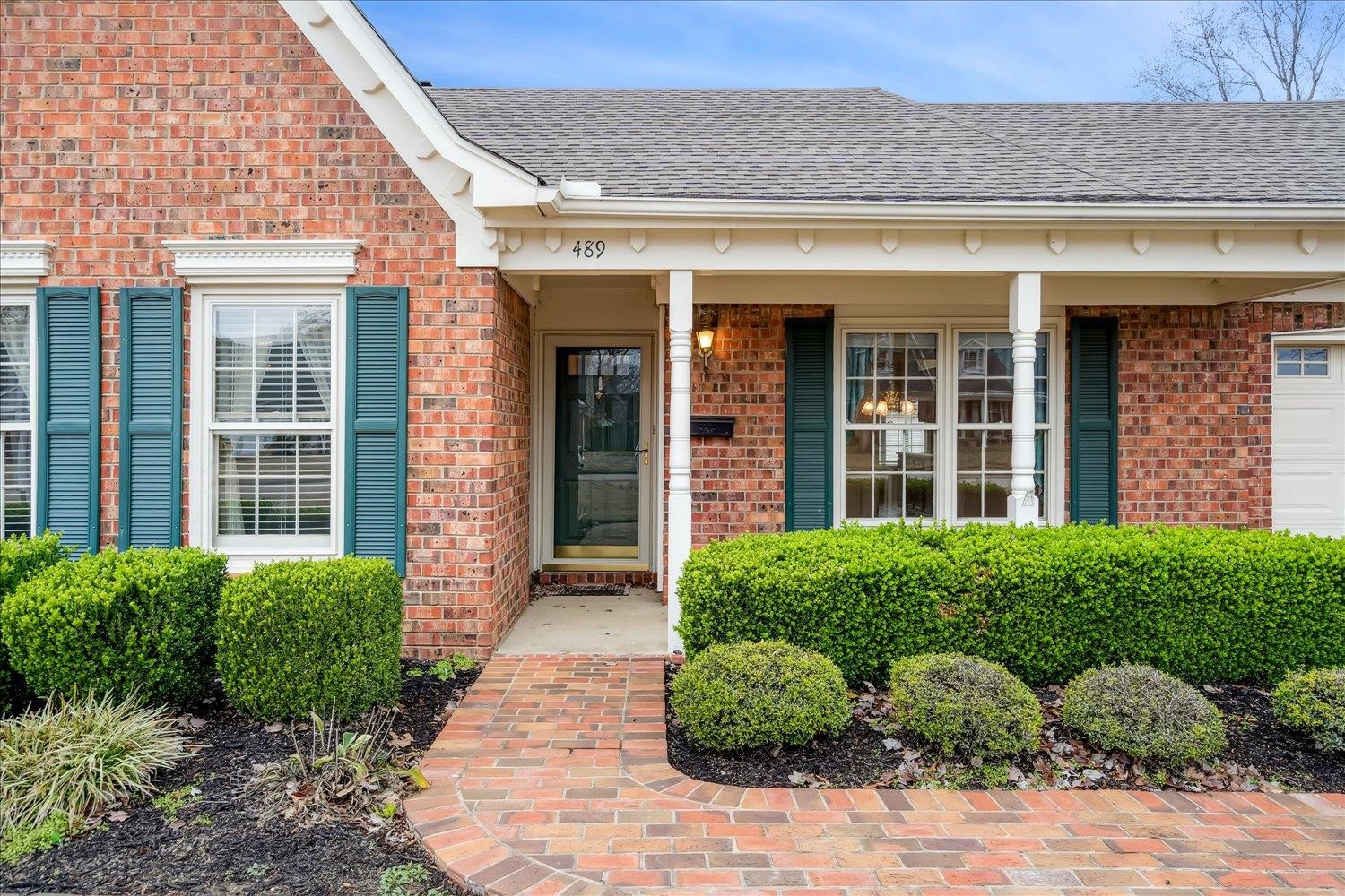 489 Autumn Trail Cove Collierville, TN 38017 - Photo 4 of 30 a view of a house with a garden