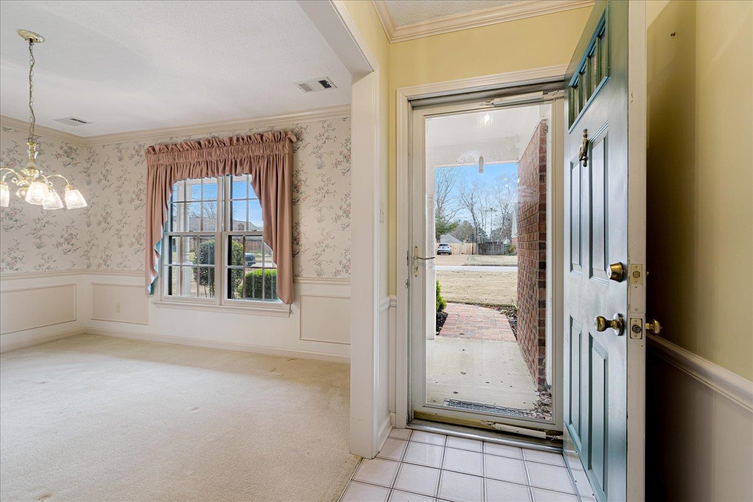 489 Autumn Trail Cove Collierville, TN 38017 - Photo 5 of 30 a view of an empty room with windows