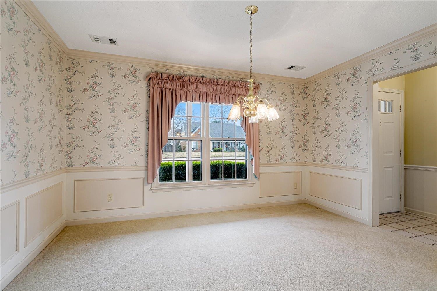 489 Autumn Trail Cove Collierville, TN 38017 - Photo 7 of 30 a view of a bathroom with a tub and window