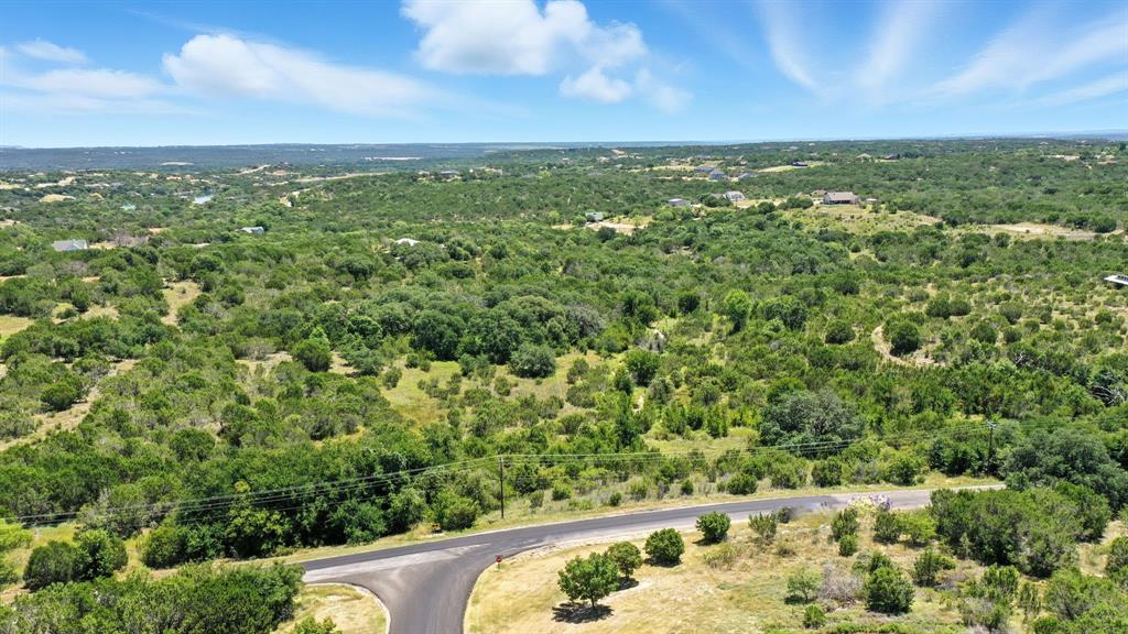 Tbd Compass Way Bluff Dale, TX 76433 - Photo 2 of 23 a view of a green field with an ocean