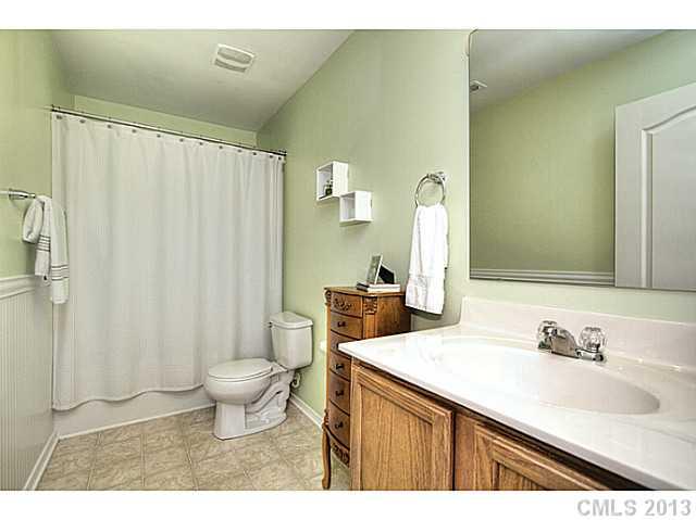 661 Potter Place Road, Unit 106 Fort Mill, SC 29708 - Photo 11 of 16 a bathroom with a sink toilet and shower