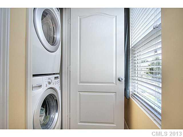 661 Potter Place Road, Unit 106 Fort Mill, SC 29708 - Photo 12 of 16 a utility room with dryer and washer
