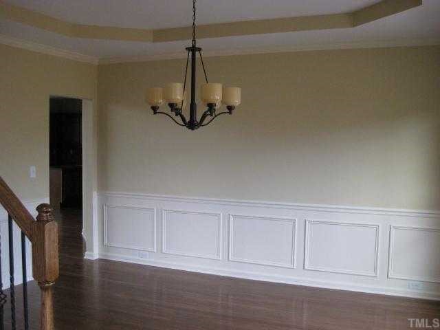 2101 Lower Lake Road Wake Forest, NC 27587 - Photo 12 of 12 Enjoy special meals in your elegant dining room with trey ceiling & crown molding, chair rail & picture molding.