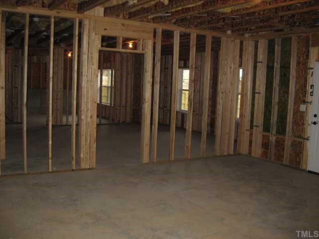2101 Lower Lake Road Wake Forest, NC 27587 - Photo 8 of 12 TONS of usable space in unfinished walk-out basement! Already plumbed for a kitchenette & full bath!