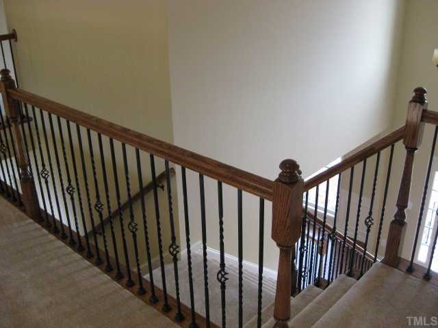 2101 Lower Lake Road Wake Forest, NC 27587 - Photo 10 of 12 Split staircase! One side goes down to foyer, the other side to family room/kitchen!