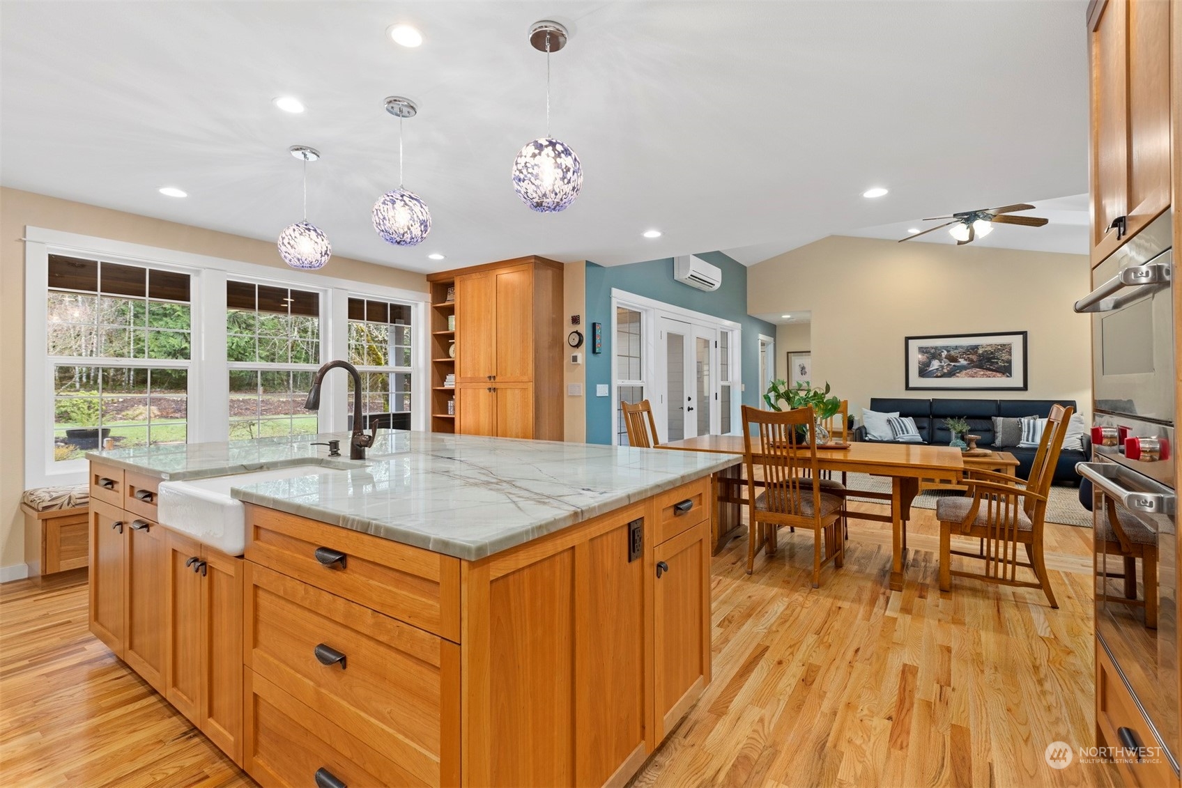 3313 Y Road Bellingham, WA 98226 - Photo 11 of 40 a kitchen with counter top space sink stove and wooden floor