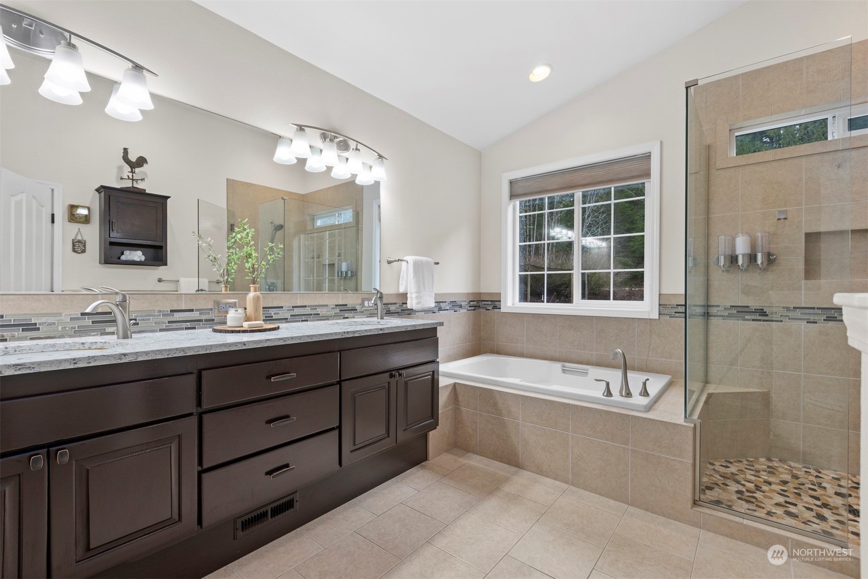 3313 Y Road Bellingham, WA 98226 - Photo 14 of 40 a bathroom with a tub double sink shower and mirror