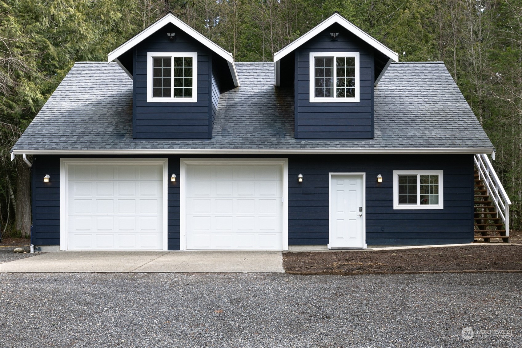 3313 Y Road Bellingham, WA 98226 - Photo 28 of 40 a front view of a house with a yard and garage