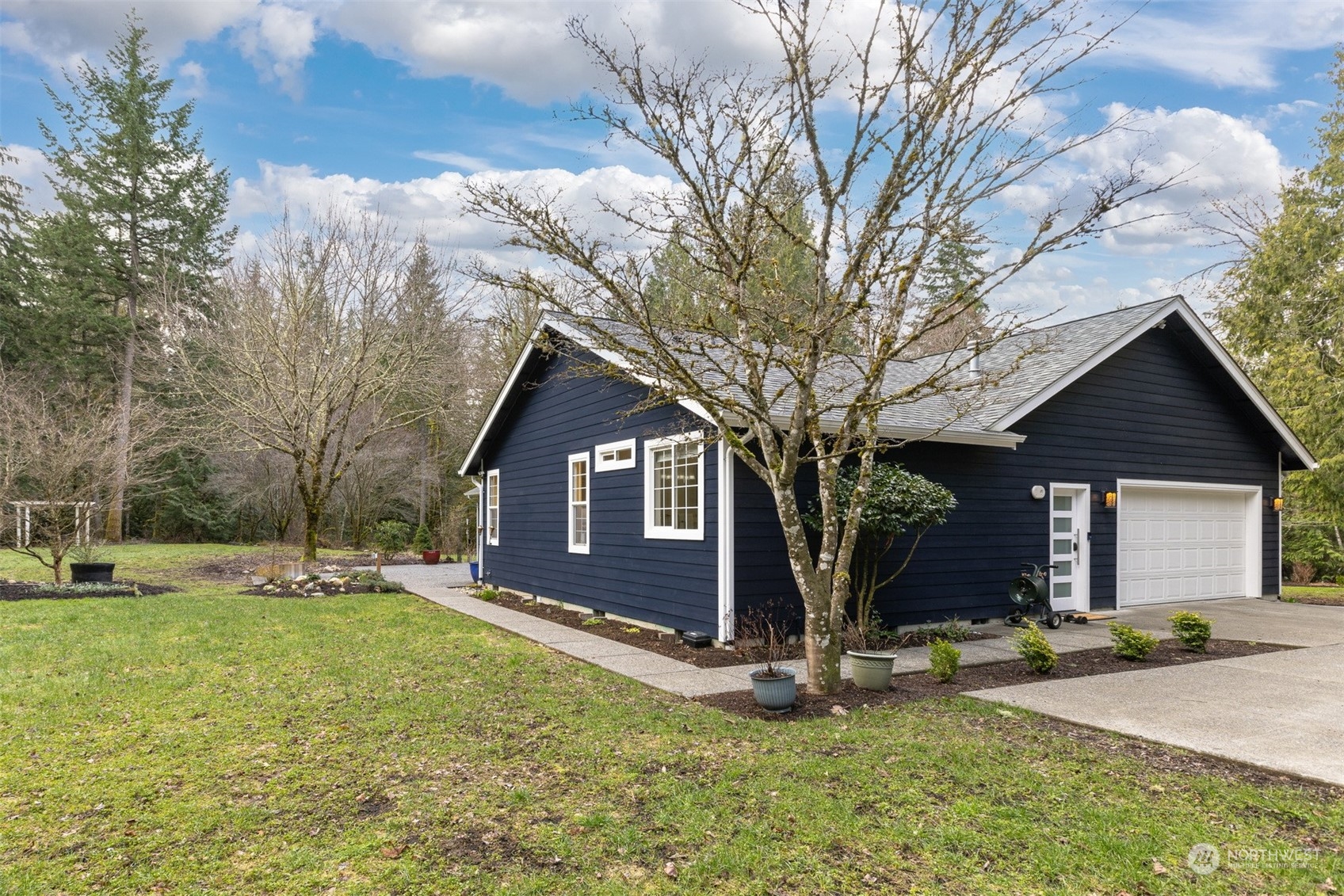 3313 Y Road Bellingham, WA 98226 - Photo 37 of 40 a view of a house with yard and tree s