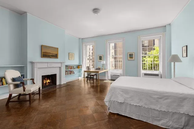 a view of livingroom with hardwood floor and a ceiling fan