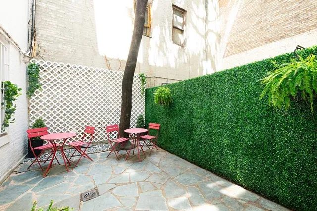 a living room with furniture kitchen view and a table