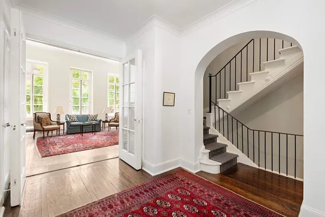 a living room with furniture a fireplace and a fireplace