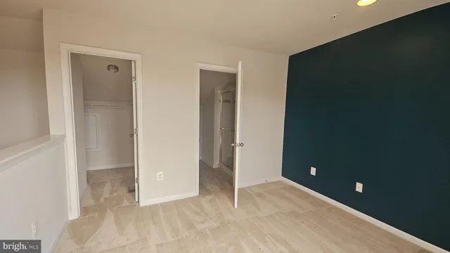 wooden floor and a bathroom with sink