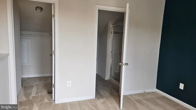 a view of an empty room and window