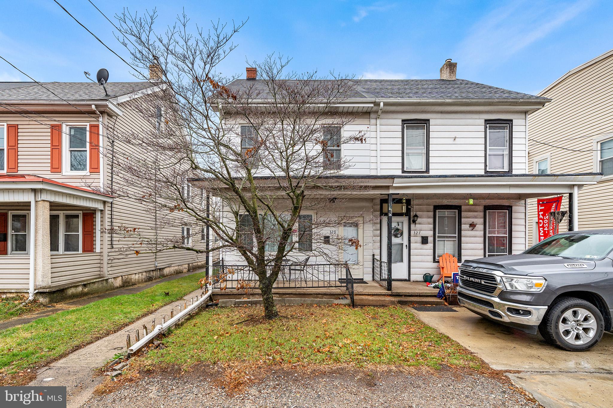 329 South Hanover Street Pottstown, PA 19465 - Photo 23 of 23 a car parked in front of a house