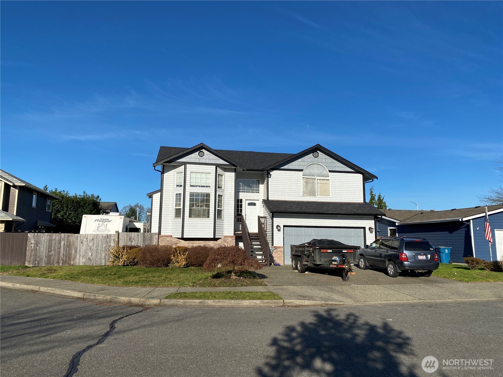 16957 158th Place Southeast Monroe, WA 98272 - Photo 2 of 2 a car parked in front of a house