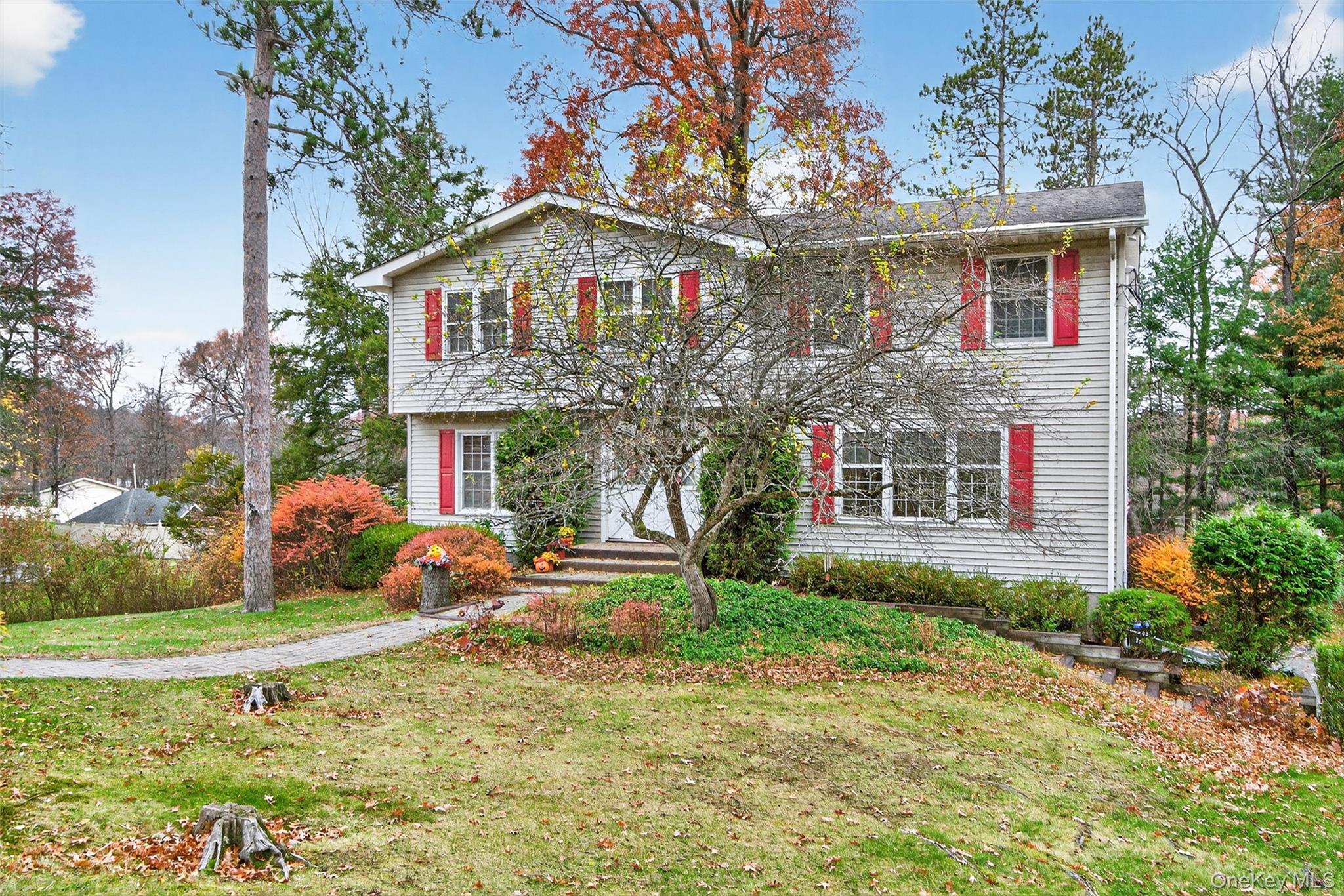 6 Sayer Road Blooming Grove, NY 10914 - Photo 1 of 1 a front view of a house with garden