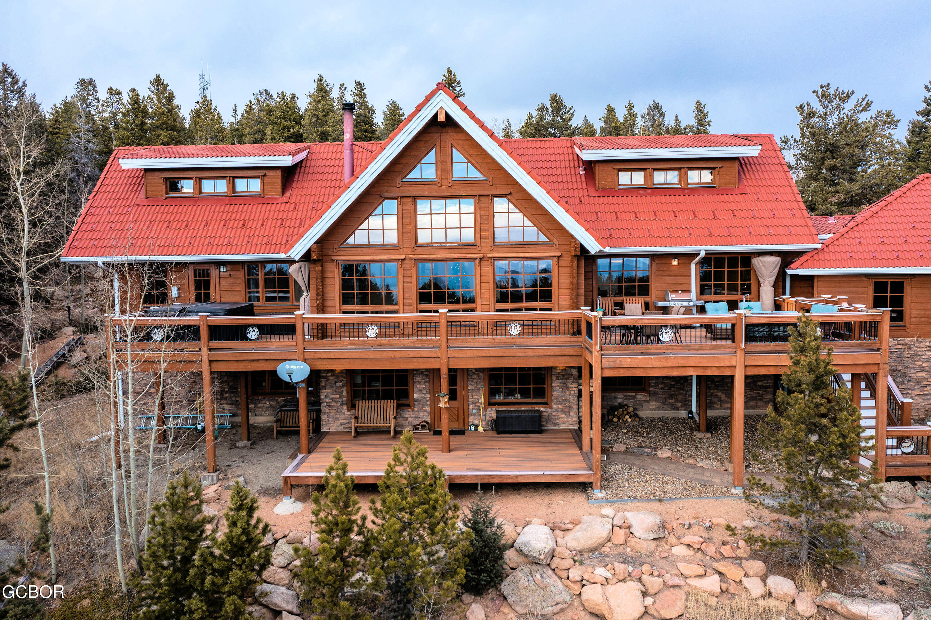 11006 Timothys Drive Conifer, CO 80433 - Photo 2 of 45 a view of a cafe with sitting area