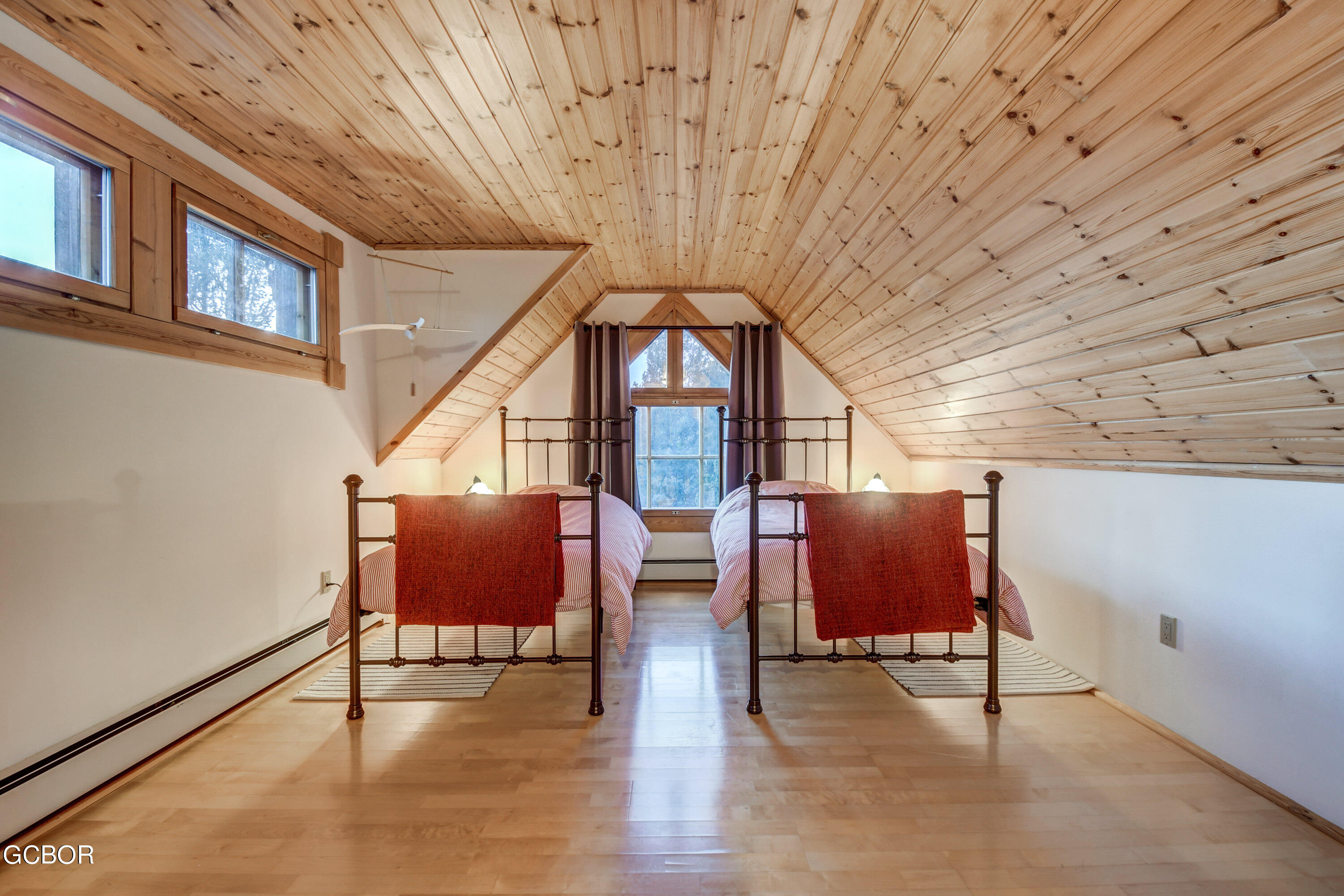 11006 Timothys Drive Conifer, CO 80433 - Photo 26 of 45 a view of furniture with window and wooden floor