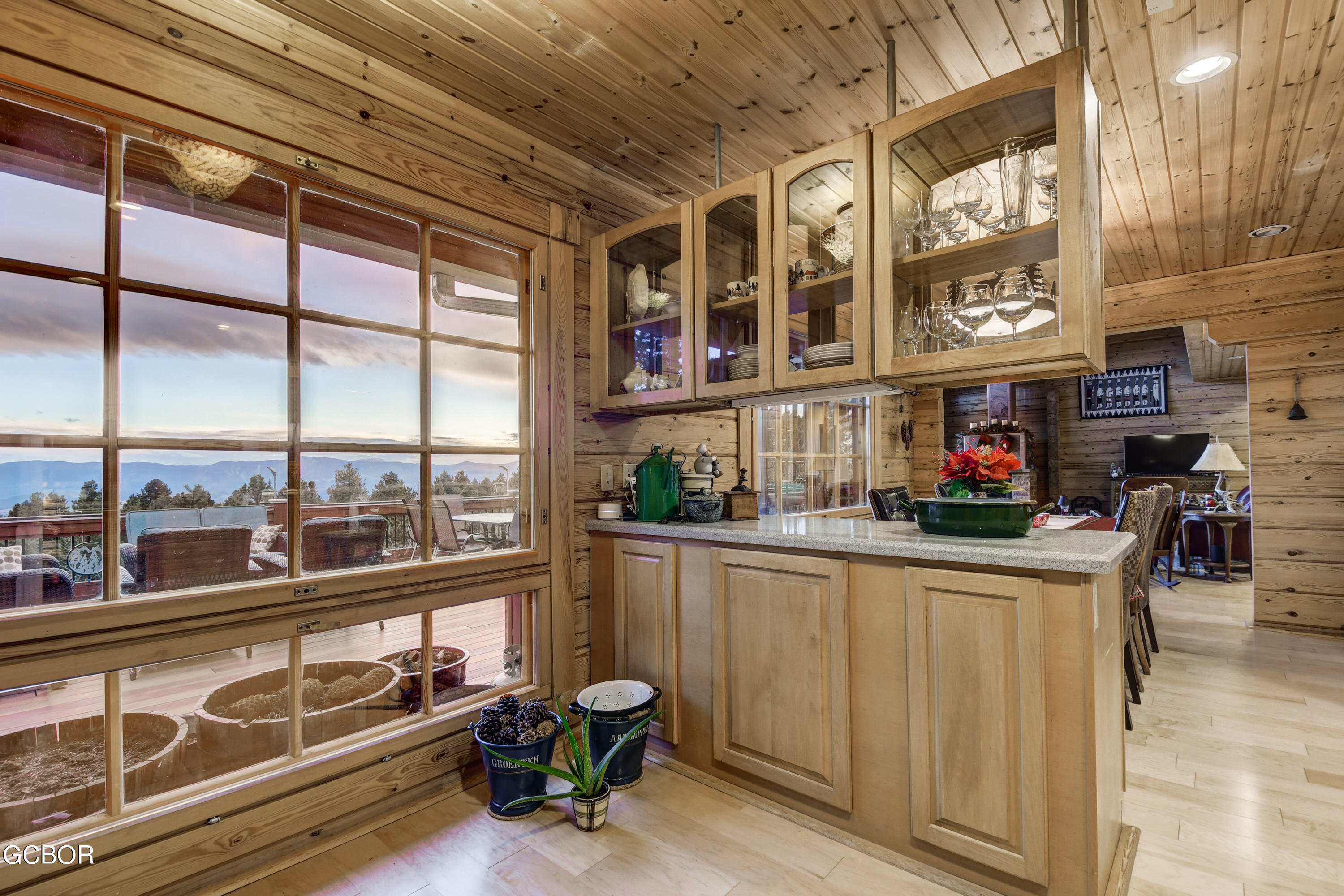 11006 Timothys Drive Conifer, CO 80433 - Photo 34 of 45 a kitchen with stainless steel appliances granite countertop a stove and cabinets