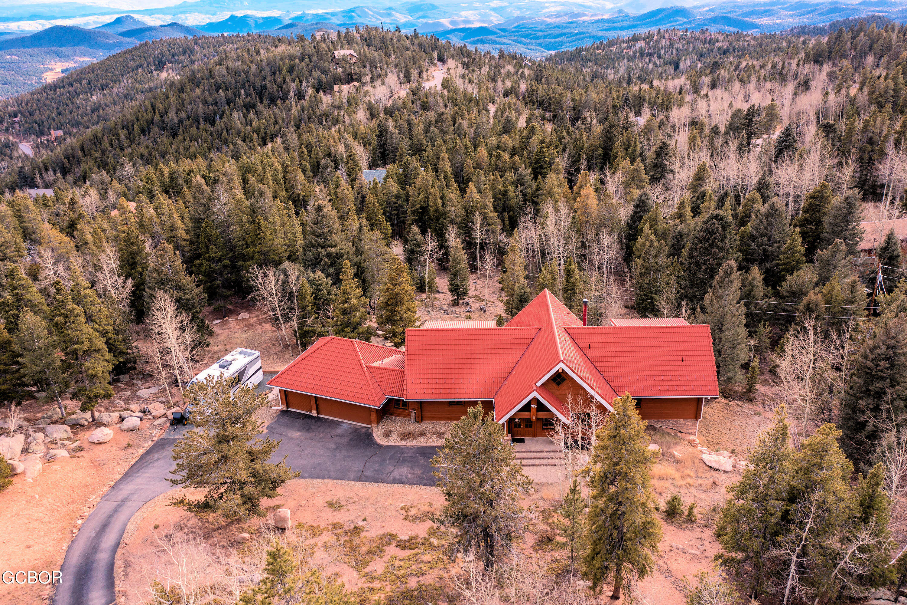 11006 Timothys Drive Conifer, CO 80433 - Photo 41 of 45 an aerial view of a house with a yard